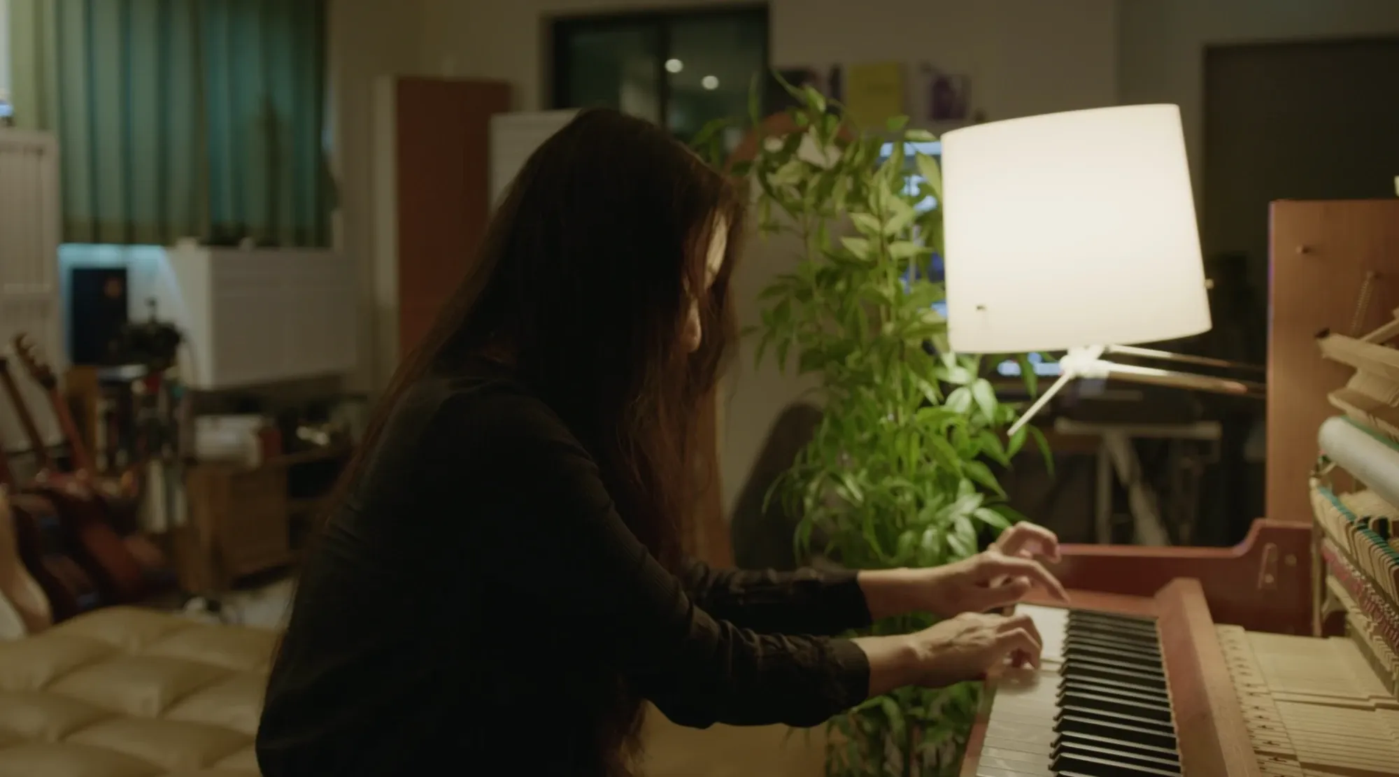 Hyunsoo Lee playing in the studio